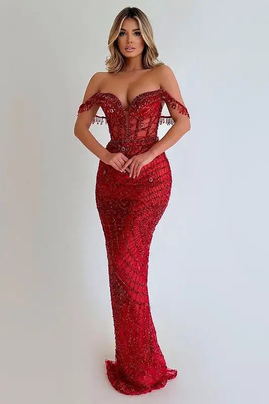 Glamorous Red Sequin Prom Gown with Tassel Detail and Strapless Design