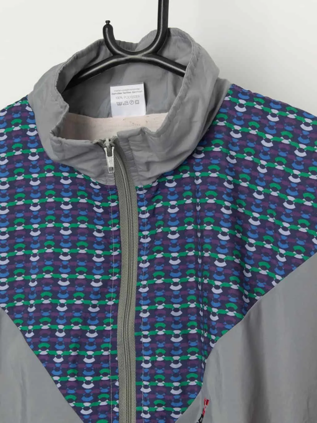 Vintage 90s shell suit jacket with colourful chest pattern – Medium